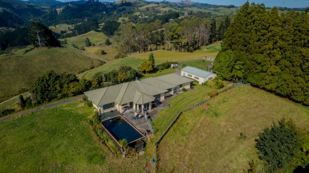 Modern Kiwi country home with pool nestled in the hills above Tauranga